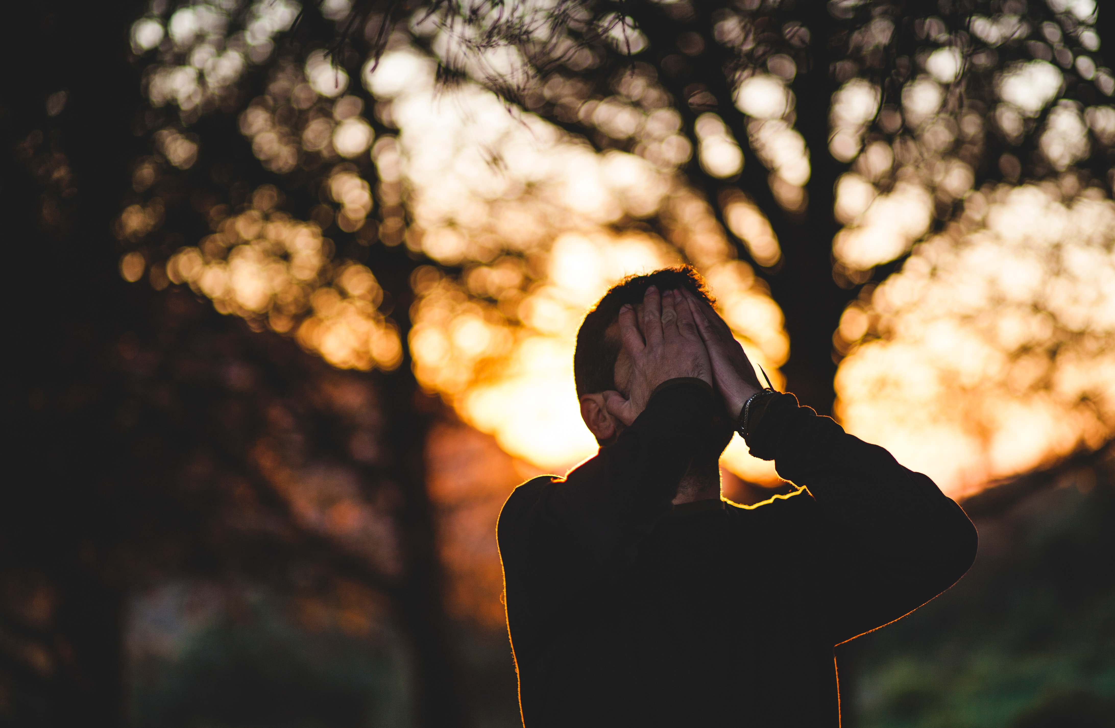 A man stressed by eating outside his keto lifestyle